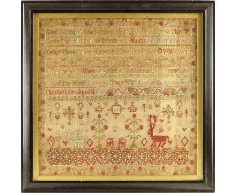 A Regency needlework sampler by Elizabeth Kirk, worked with a band of flowers with a verse, crowns, a stag, trees and signed 