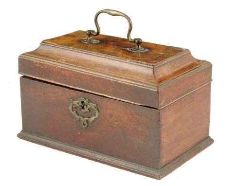 A George III mahogany tea caddy, the hinged lid with a brass handle, revealing a triple lidded divided interior, 13.8cm high,