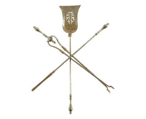 A set of three early Victorian steel fire tools, each with a faceted baluster handle, with a pierced pan, 78cm long. (3) Prov