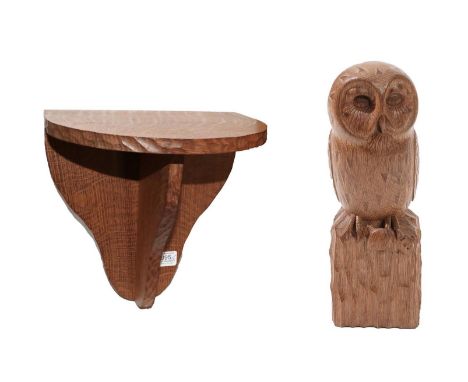 Workshop of Robert Mouseman Thompson (Kilburn): An English Oak Owl, carved as a standing owl holding a mouse in its talon on 
