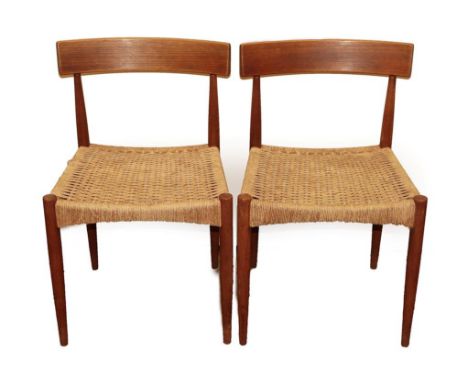 A Pair of 1960's Danish Mogens Kold Teak Dining Chairs, with woven seats, each labelled CRAFTSMANSHIP M K MADE IN DENMARK DAN