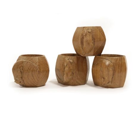 Workshop of Robert Mouseman Thompson (Kilburn): Four English Oak Napkin Rings, of standard octagonal form, each with carved m