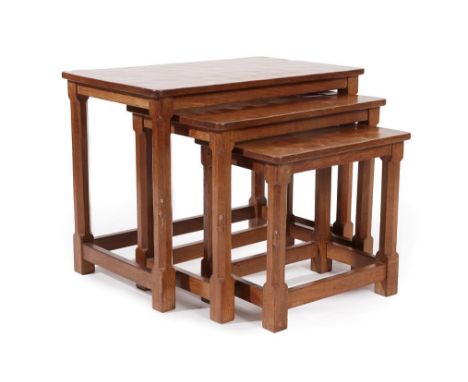 Workshop of Robert Mouseman Thompson (Kilburn): An English Oak Nest of Three Tables, post 1960, adzed rectangular tops, on fo