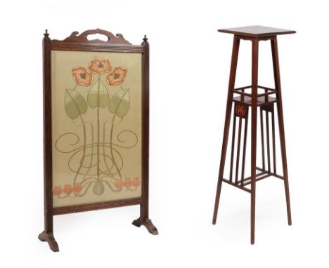 An Art Nouveau Inlaid Mahogany Plant Stand, the square top inlaid to each corner, above a railed tier, on four tapering squar