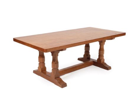 Workshop of Robert Mouseman Thompson (Kilburn): An English Oak 4ft Rectangular Refectory Coffee Table, post 1960, on four oct