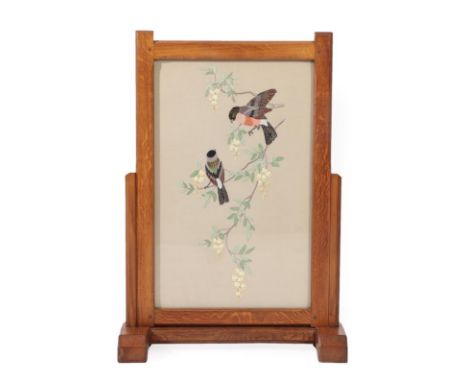 Cat and Mouseman: Lyndon Hammell (Harmby): An English Oak Firescreen, the frame inset with a woolwork panel, on two sledge fe