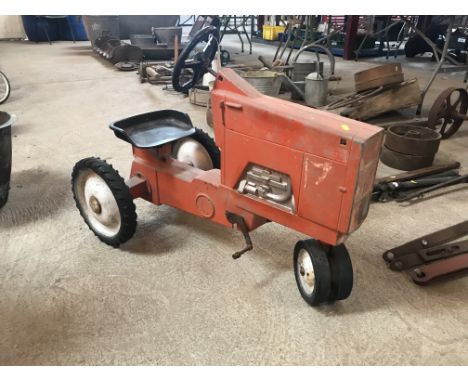 An American pedal tractor for restoration