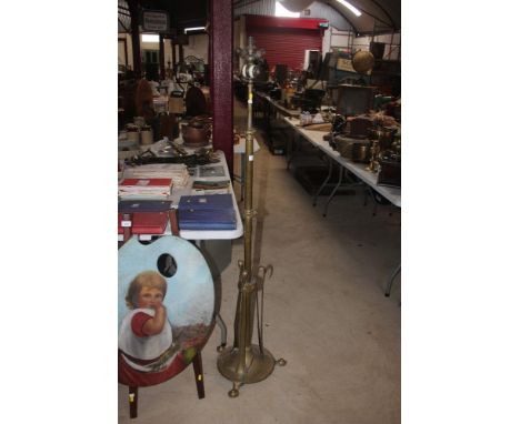 A brass Art Nouveau telescopic standard lamp