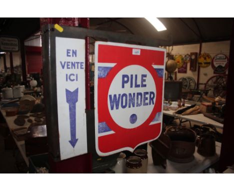 A "Pile Wonder" double sided enamel advertising sign, 45cm x 55cm overall