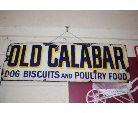 A rectangular enamel advertising sign for "Old Calabar Dog Biscuits and Poultry Food", 30cm x 91cm