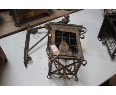 A wrought iron porch lamp AF