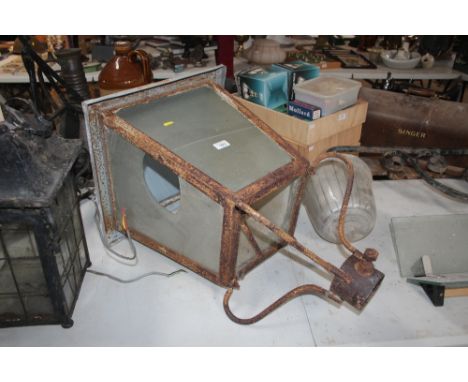 An antique wrought metal street lamp top AF