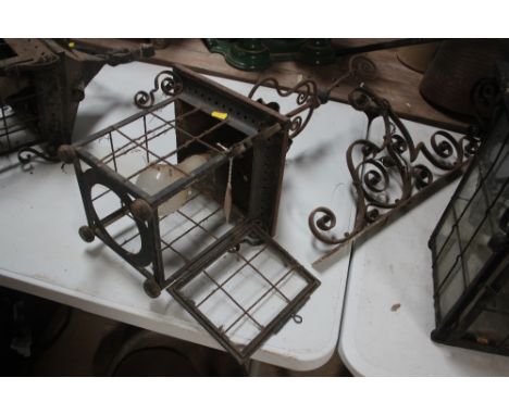A wrought iron porch lamp  AF