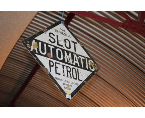 A double sided diamond shaped enamel advertising sign for "The Brecknell Slot Automatic Petrol"