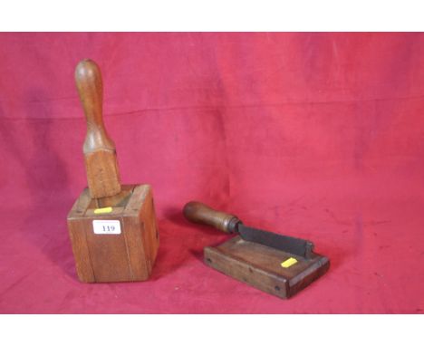 A vintage tobacco cutter and wooden press
