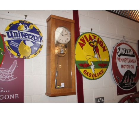 A light oak cased German Telephonbau and Normalzeitz masters clock having visual pendulum and movement, 93cm