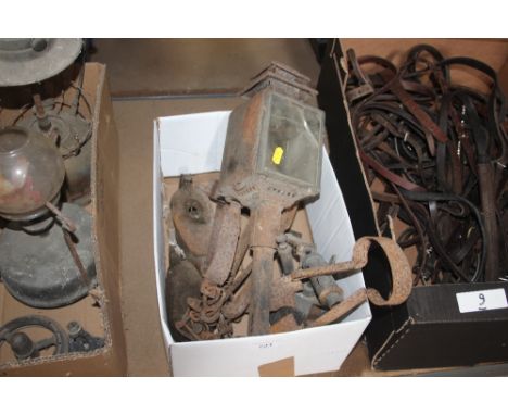 An old carriage lamp; a pair of shears; blow lamp; oil lamp; traps etc.
