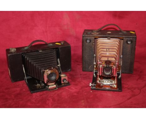 A No.3-A folding Brownie No.2219 camera and a No.4 cartridge Kodak automatic Eastman camera
