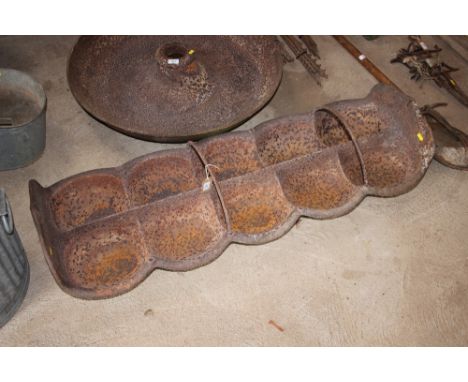 A Stearns Suffolk cast iron pig feeding Trough by Ransomes &amp; Sims