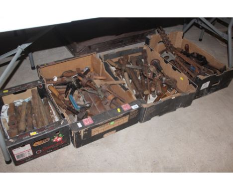 Four boxes of various wood working tools to include chisels, augers, drills etc.