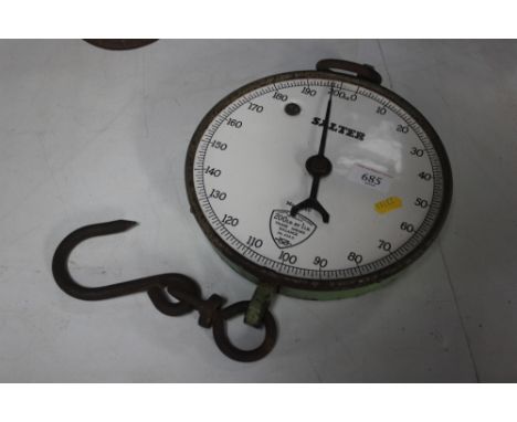 A set of Salter spring balance scales with white enamel face