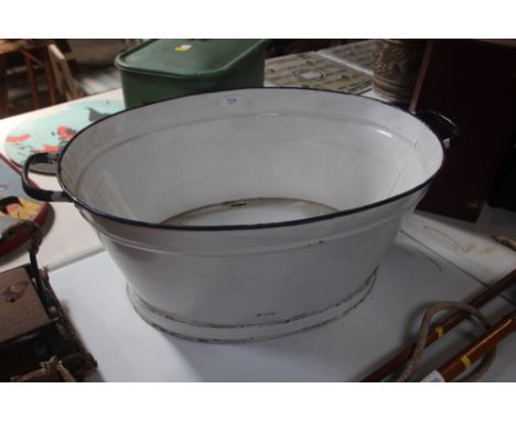 A small enamel bath