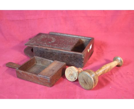A collection of various treen items to include a candle box, collection box, butter print, pestle etc. 