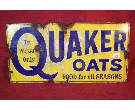 An enamel advertising sign for "Quaker Oats", 30cm x 61cm