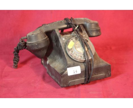 A vintage black telephone 