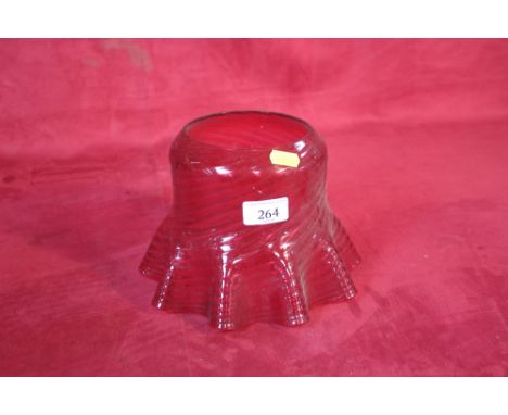A Victorian cranberry glass oil lamp shade having crimped boarder; 21cm diameter overall, 15cm high 