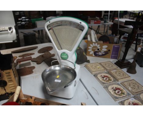 A set of Avery white enamel shop scales