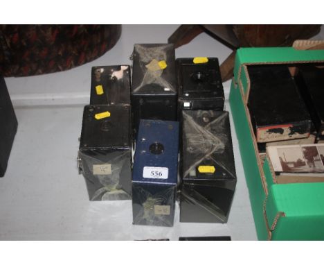 A Portrait Hawk-eye Star Kodak camera and case; a No.2 Brownie boxed camera made in Canada and case; a JB Ensign boxed camera
