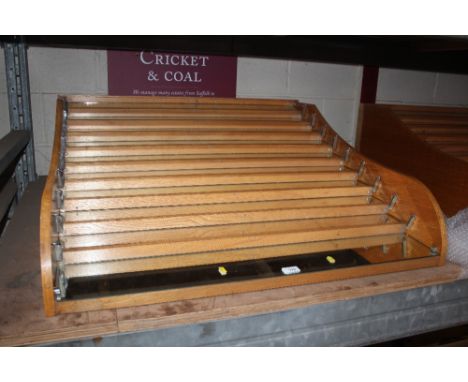 A light oak and chrome mounted vintage graduated shop display stand, 93.5cm wide