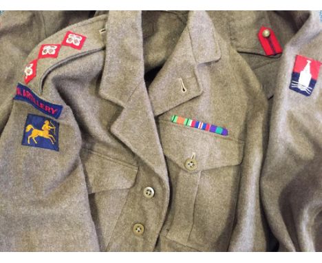 A POST SECOND WORLD WAR ROYAL ARTILLERY BATTLE DRESS and one other.