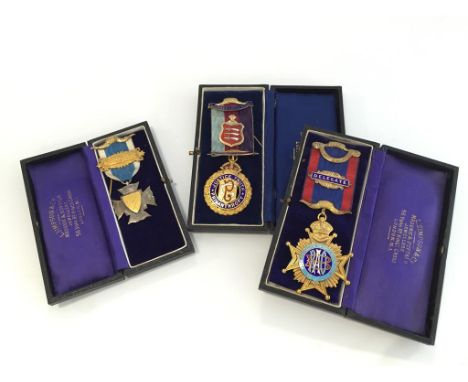 ORDER OF THE BUFFALOS, three silver medals, two with enamel decoration in leather cases. (3)