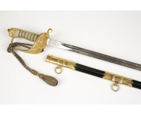 A NAVAL OFFICERS SWORD with shagreen grip and leather scabbard, engraved on catch bracket 'C.D.T Moriarty. R. N.', in leather