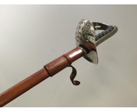 AN EDWARD VII ROYAL ENGINEERS SWORD with leather scabbard.