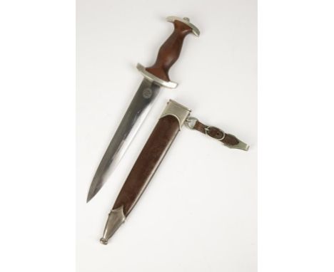 A SECOND WORLD WAR NAZI SA DAGGER, with wooden grip and engraved blade.