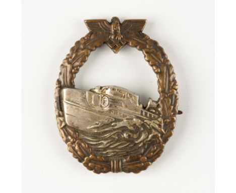 A NAZI FIRST PATTERN E-BOAT BADGE, raised mark, Schwerin Berlin 68. Notice: No historical Nazi items are guaranteed to be gen