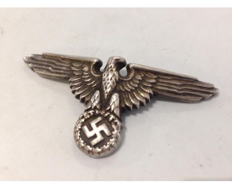 A NAZI SILVER (800) BADGE, raised marks. Notice: No historical Nazi items are guaranteed to be genuine, we ask buyers to come