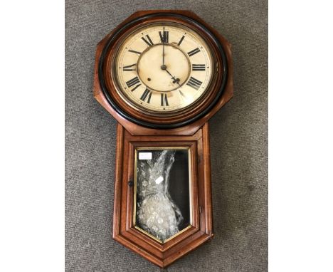 A Victorian mahogany cased Ansonia wall clock 