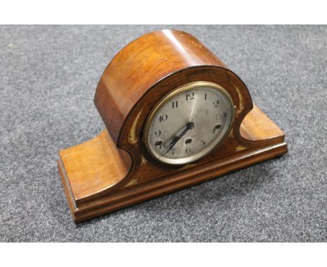 An inlaid mahogany mantel clock 