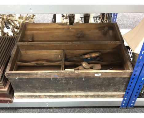 A twentieth century pine joiner's tool box containing tools, saws and plane etc