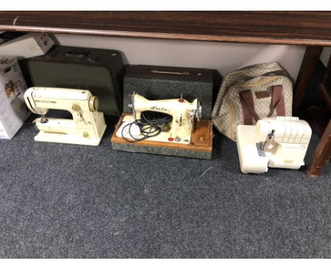 Three vintage electric sewing machines - Imagine, Lucia and Bernina 