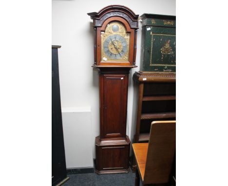 A nineteenth century mahogany longcased clock with brass and silvered dial 