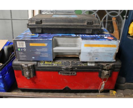 A tool box containing tools, laser level etc.