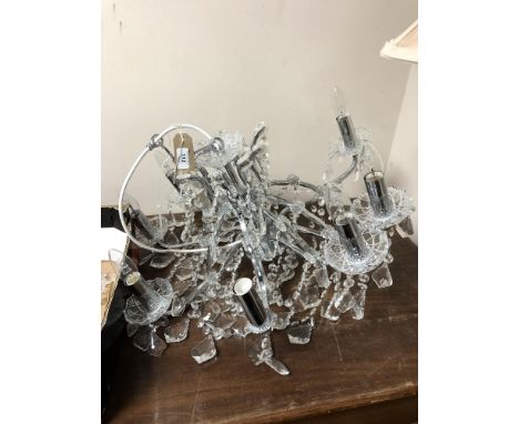 A contemporary glass and chrome chandelier