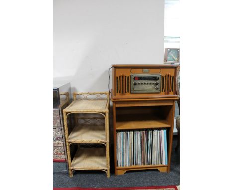 A contemporary vintage collection gramophone cd player, with audio stand, lps and three tier wicker stand