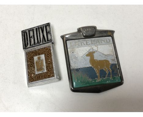 Two vintage car badges - Lakeland and Deluxe