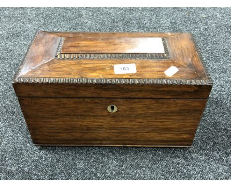 A Victorian rosewood tea caddy 